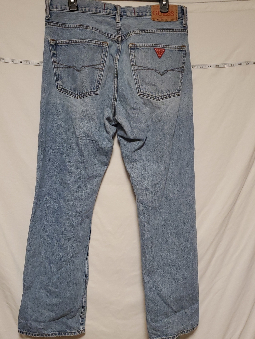 Vintage GUESS High Waist Light Wash Jeans with Red Triangle Logo 34x32